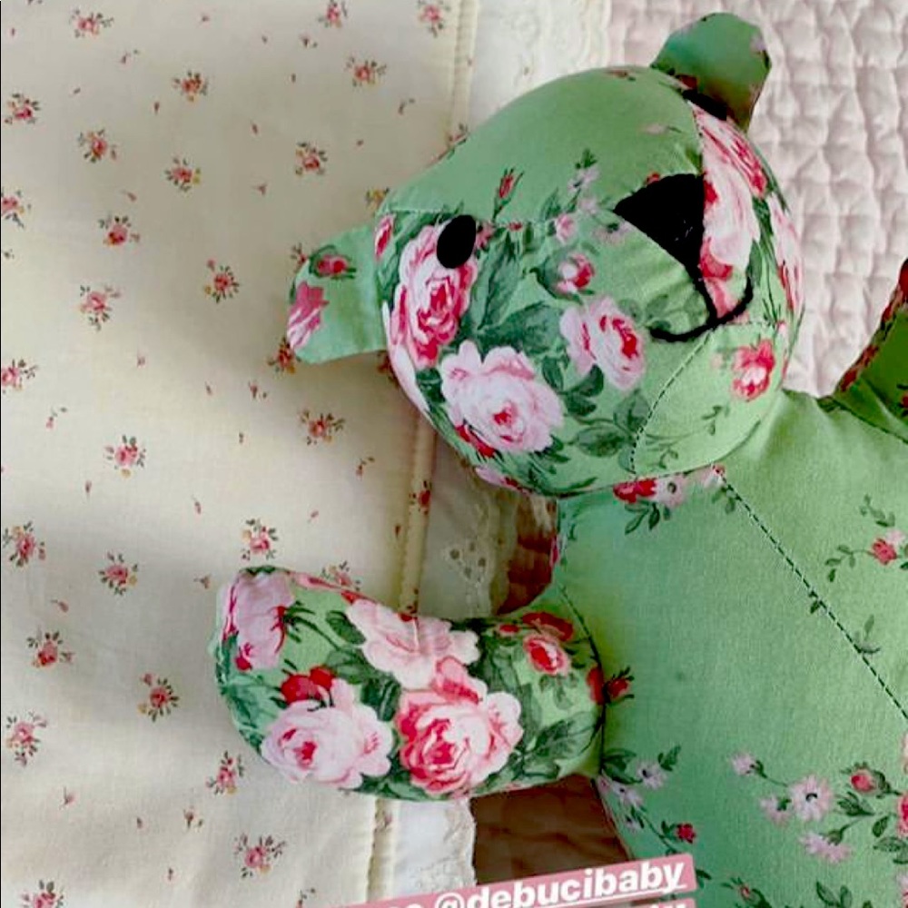 ISO Debuci Baby Teddy bear in this green floral print